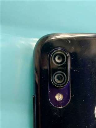 手机后置镜头有裂痕可不可以不去修理？